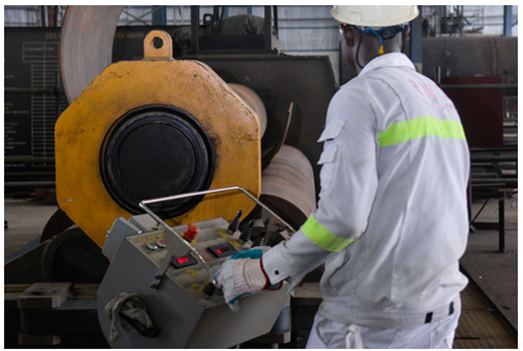 Technical staff operating industrial equipment
